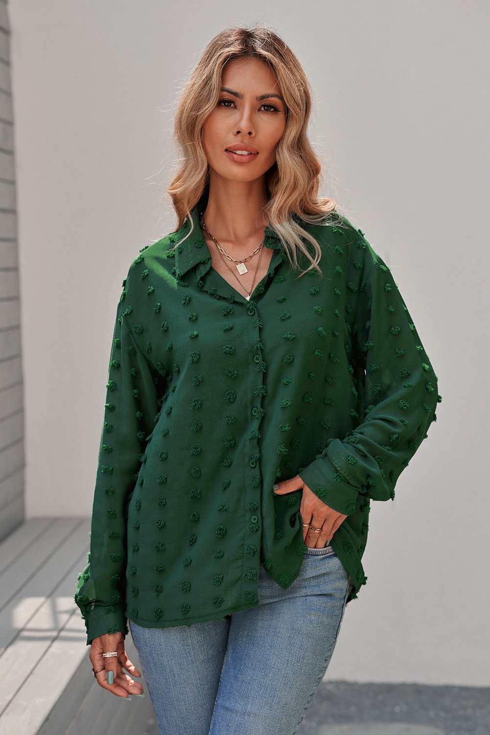 Women's green long sleeve button-up shirt with fuzzy polka dots, showcasing a relaxed fit and elegant design, perfect for work or casual wear.