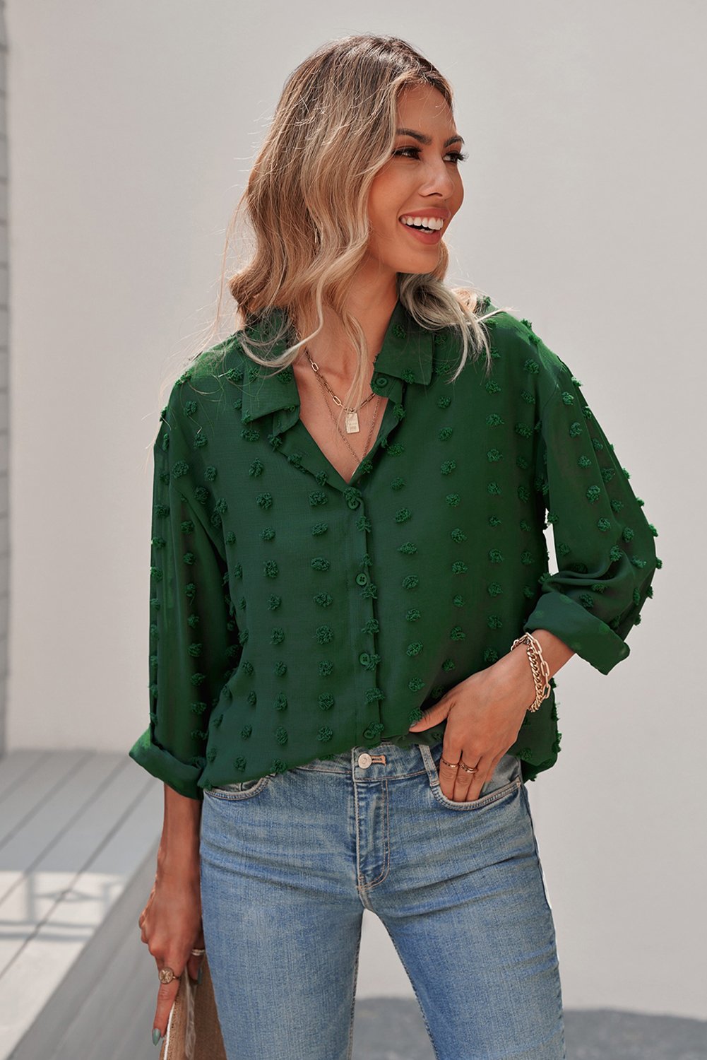 Women's green long sleeve button-up shirt with fuzzy polka dots, showcasing a relaxed fit and elegant design, perfect for work or casual wear.