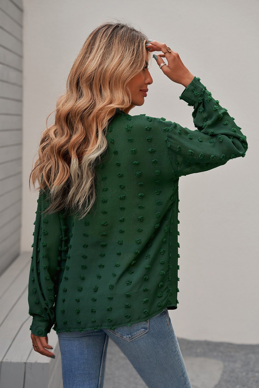 Women's green long sleeve button-up shirt with fuzzy polka dots, showcasing a relaxed fit and elegant design, perfect for work or casual wear.
