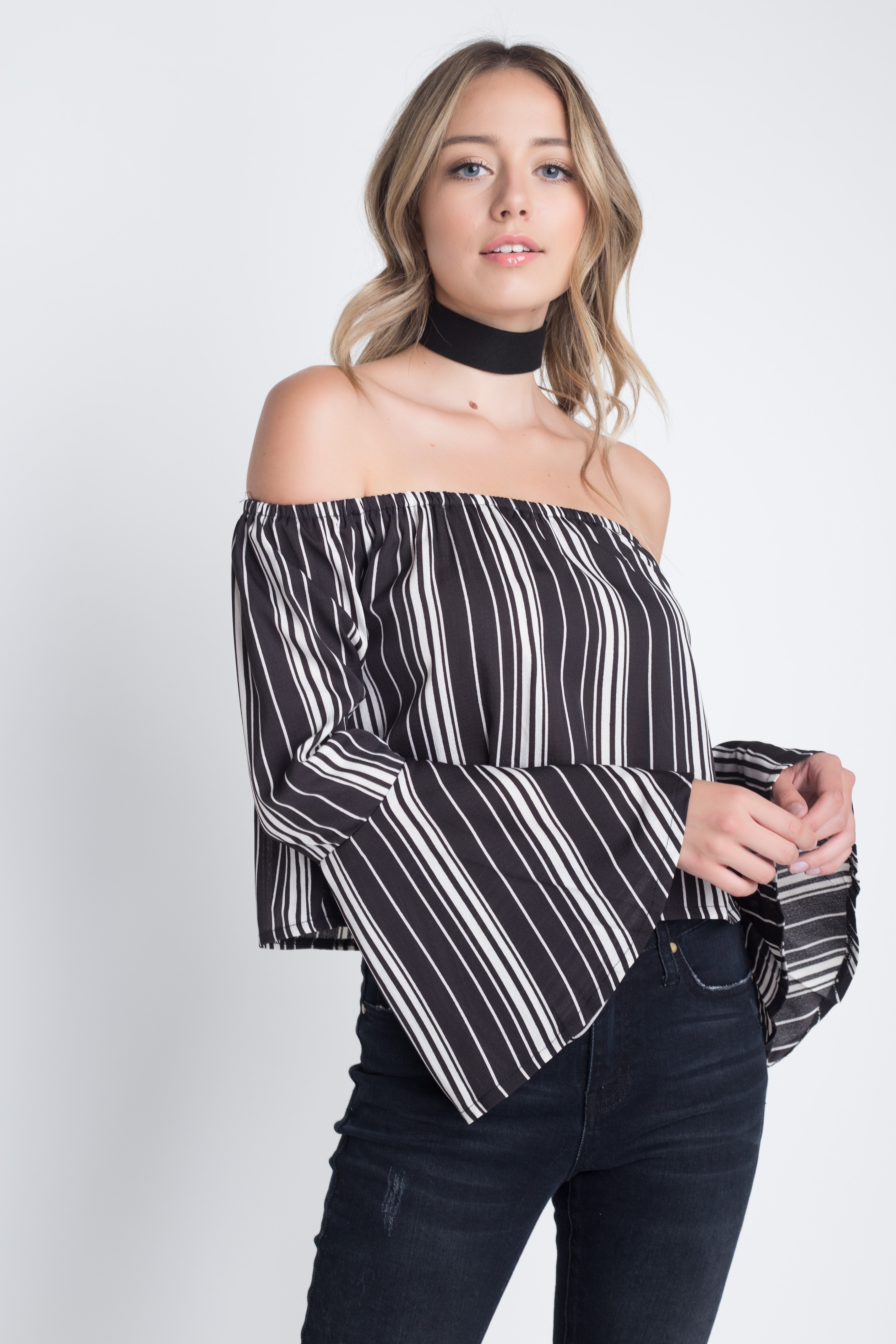 A stylish Women's Off Shoulder Casual Stripe Bell Sleeve Top featuring a trendy stripe print and elegant bell sleeves, perfect for casual outings.