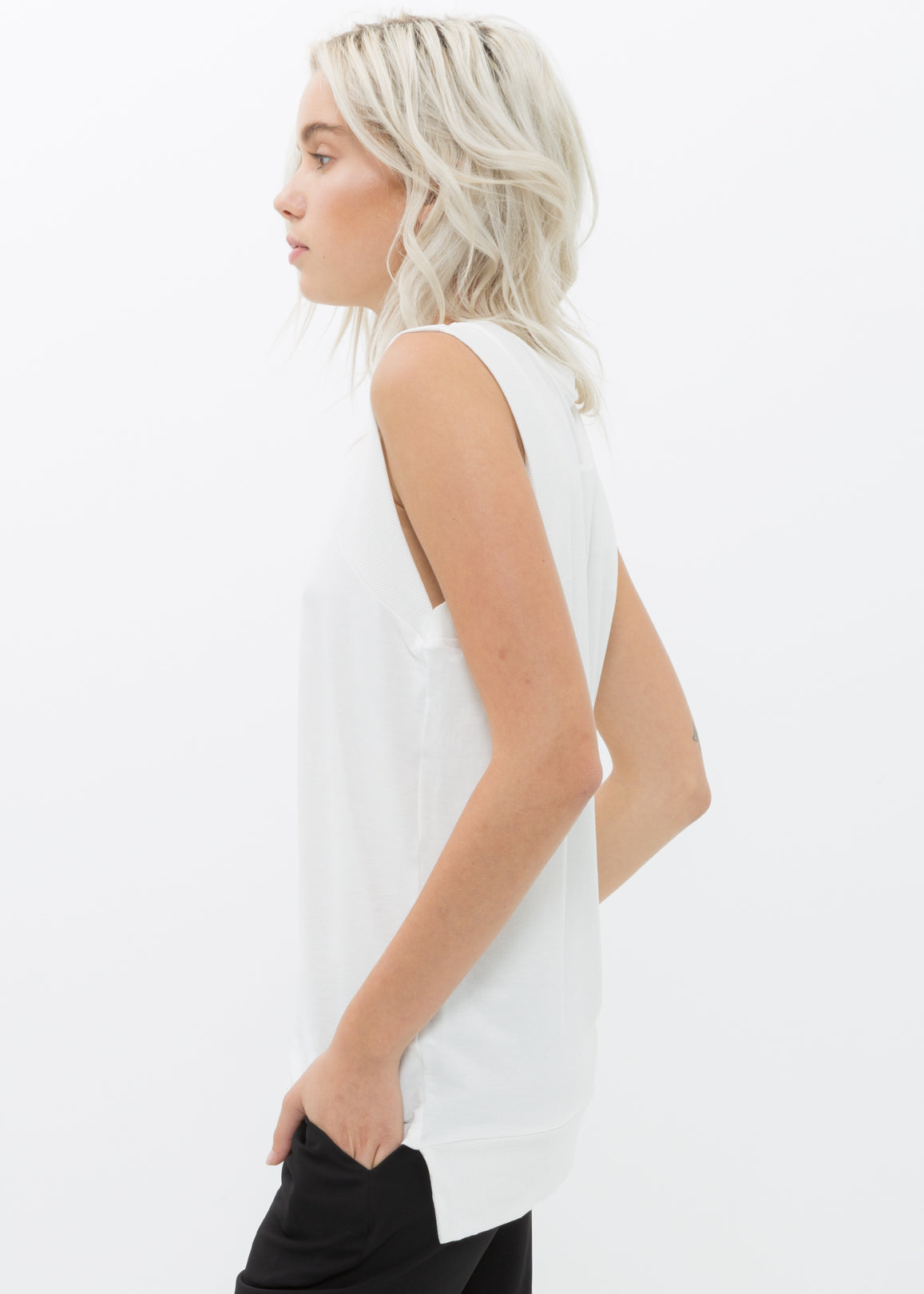 Women's Rib Contrast Muscle Tank Top in various colors, showcasing its ribbed texture and stylish design.