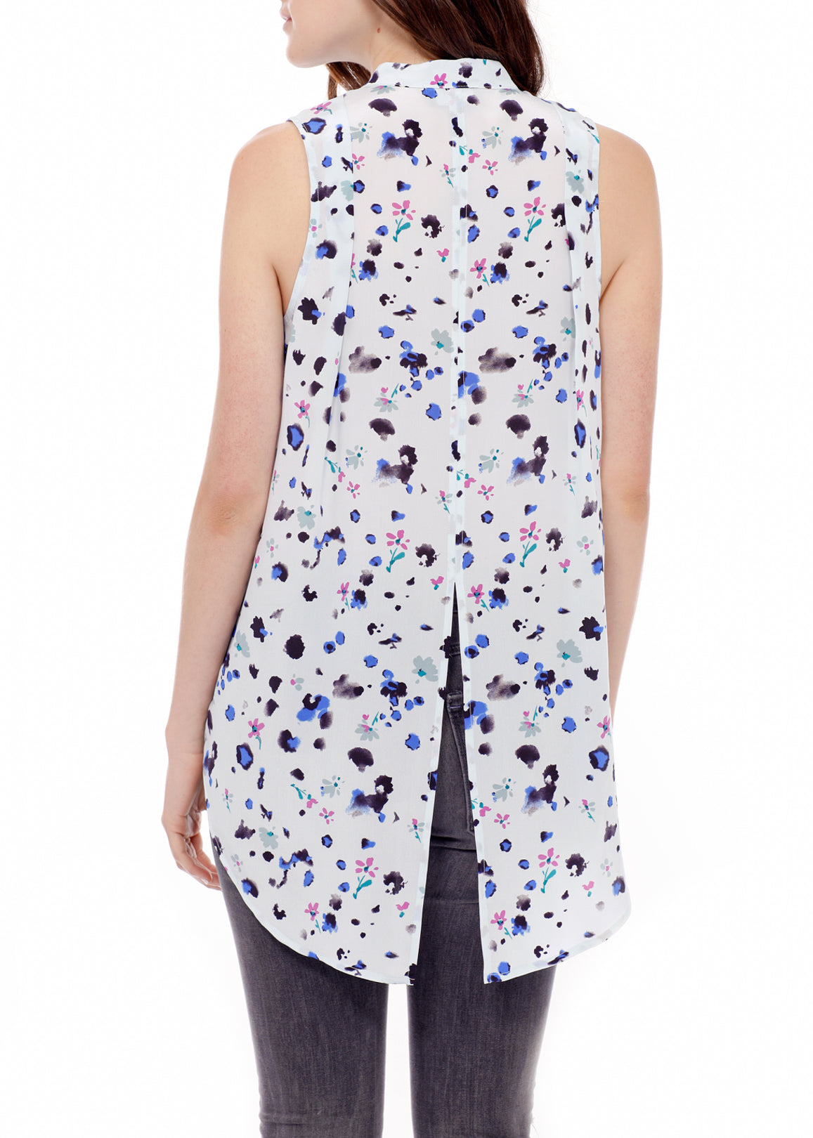 A stylish women's sleeveless mock neck sheer blouse made of 100% silk, featuring a button closure and elegant design.