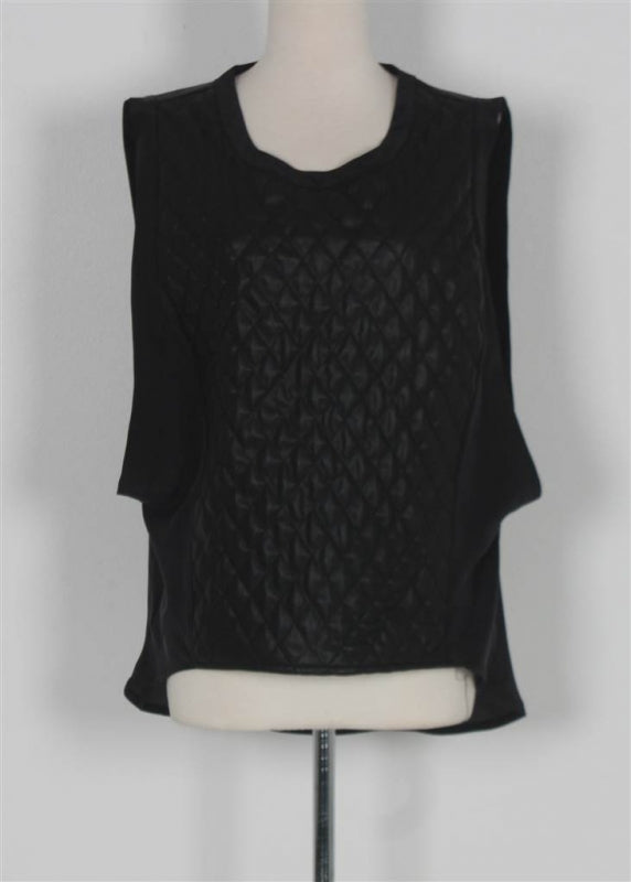 A stylish women's sleeveless quilted top made from 100% polyester with a soft polyurethane contrast, perfect for layering.