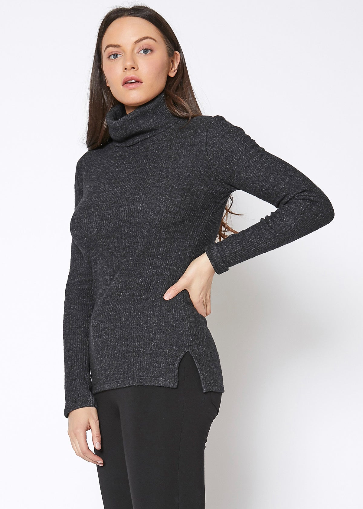 A stylish Women's Soft Turtle Neck Ribbed Knit Sweater Top in a cozy ribbed knit fabric, perfect for casual wear.