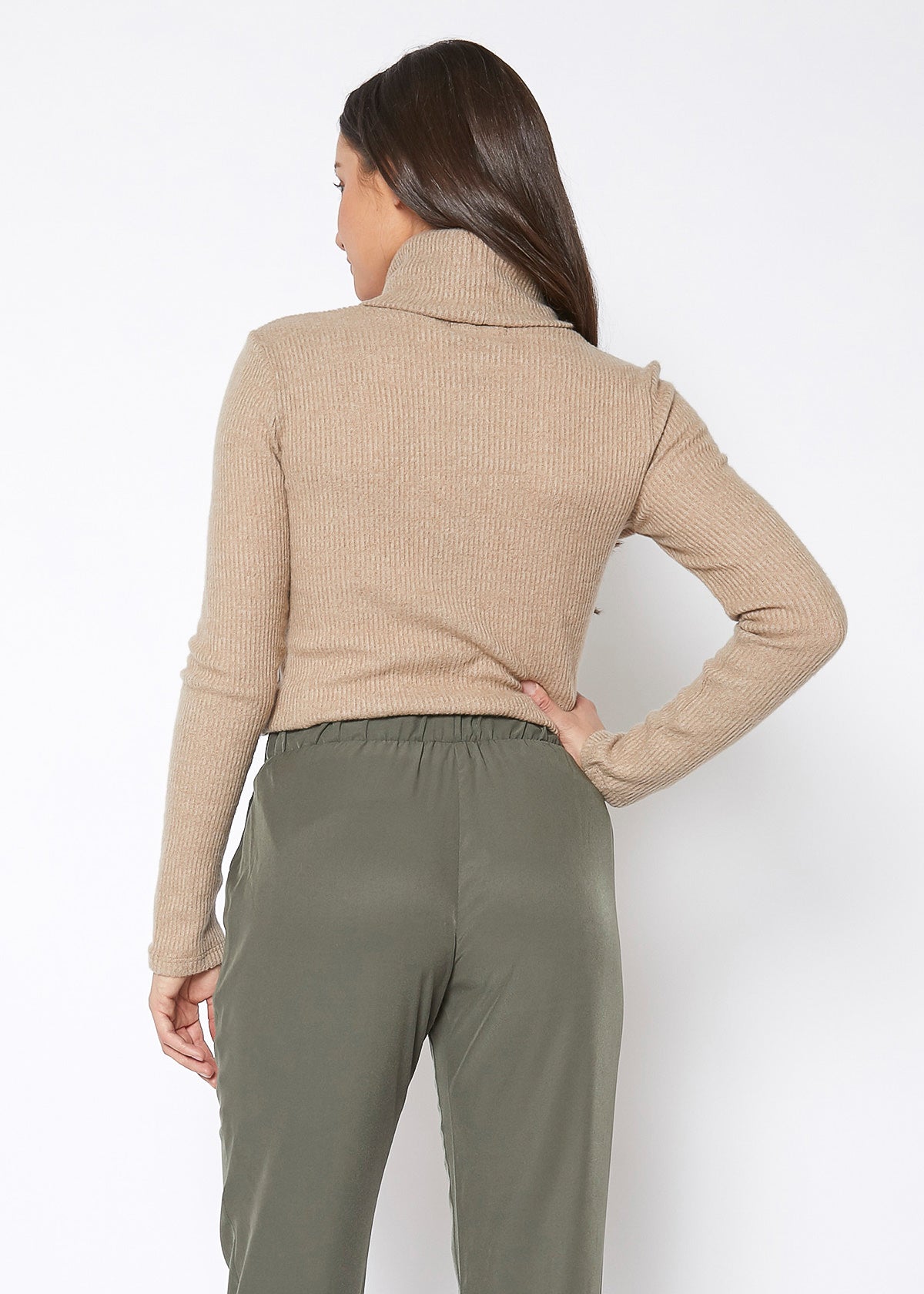 A stylish Women's Soft Turtle Neck Ribbed Knit Sweater Top in a cozy ribbed knit fabric, perfect for casual wear.