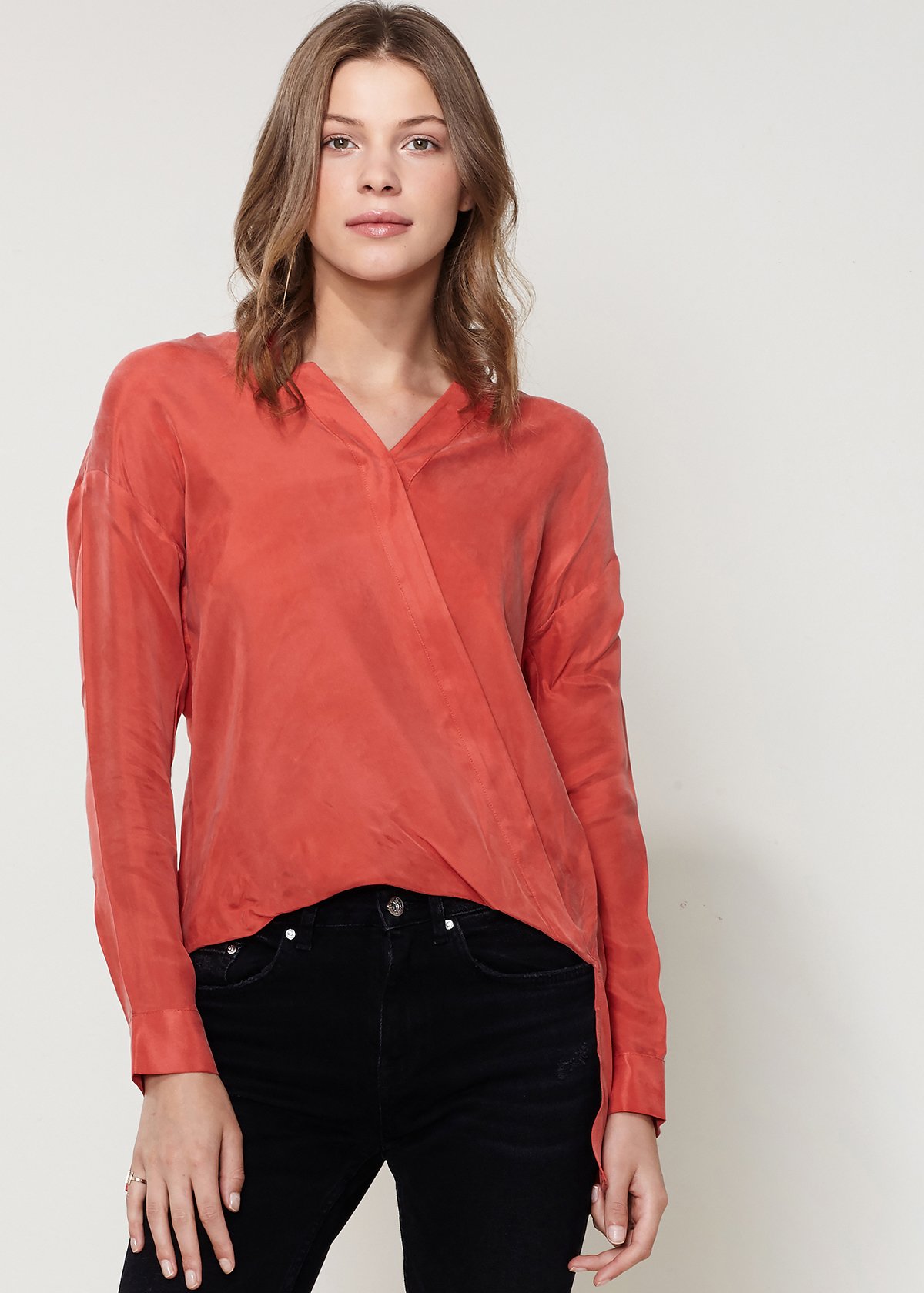 Women's Wrapped High Low Hem Blouse Top featuring a split collar design, showcasing its elegant high low hem.