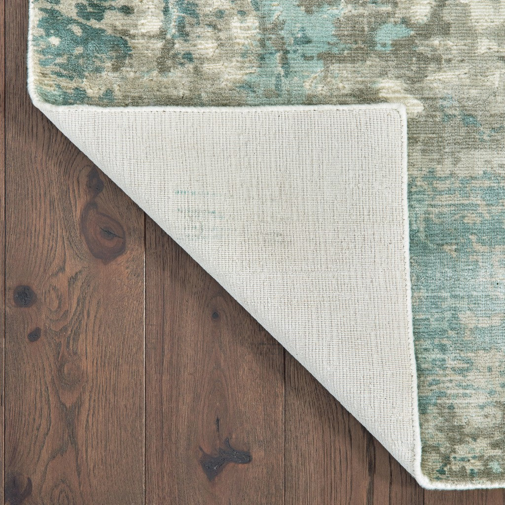 10x14 Blue and Gray Abstract Pattern Indoor Area Rug showcasing a calming pastel palette with a soft texture.