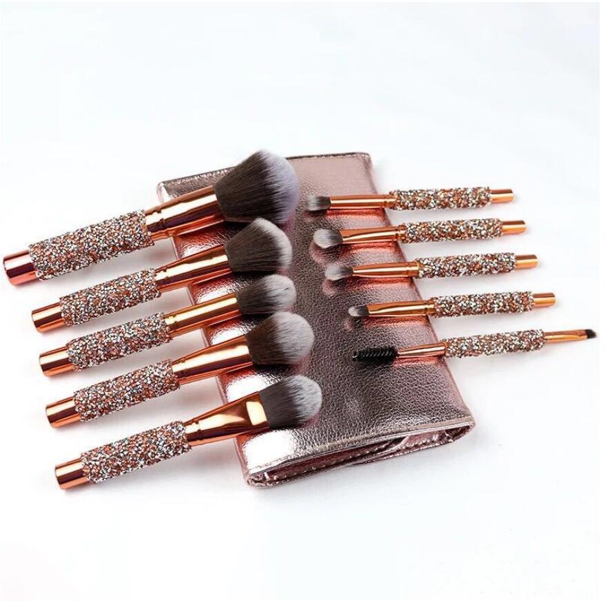 10Pcs Diamond Makeup Brushes Kit featuring synthetic hair bristles and stylish plastic handles, ideal for blending and professional makeup application.