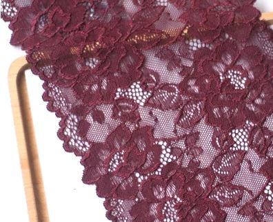 Burgundy double edge stretch floral lace fabric, 18 cm wide, showcasing intricate floral patterns.