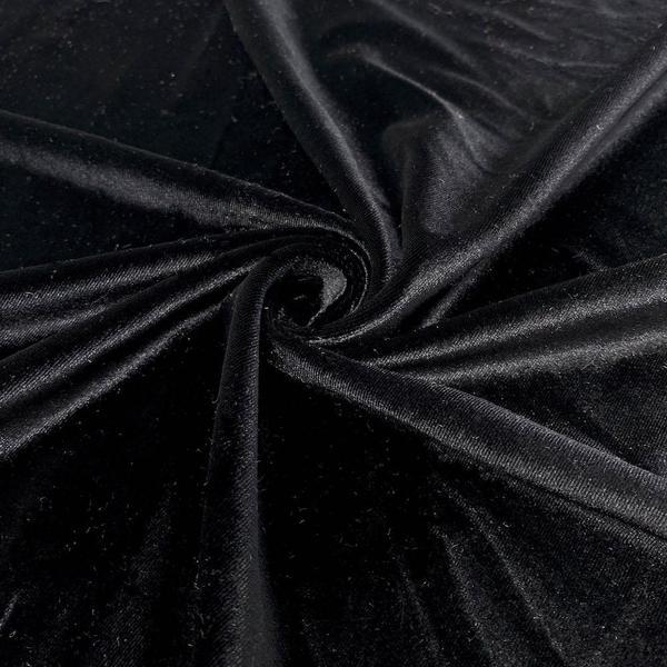 A close-up view of 1/2 YD Stretch Velvet fabric in rich black color, showcasing its soft texture and luxurious sheen.