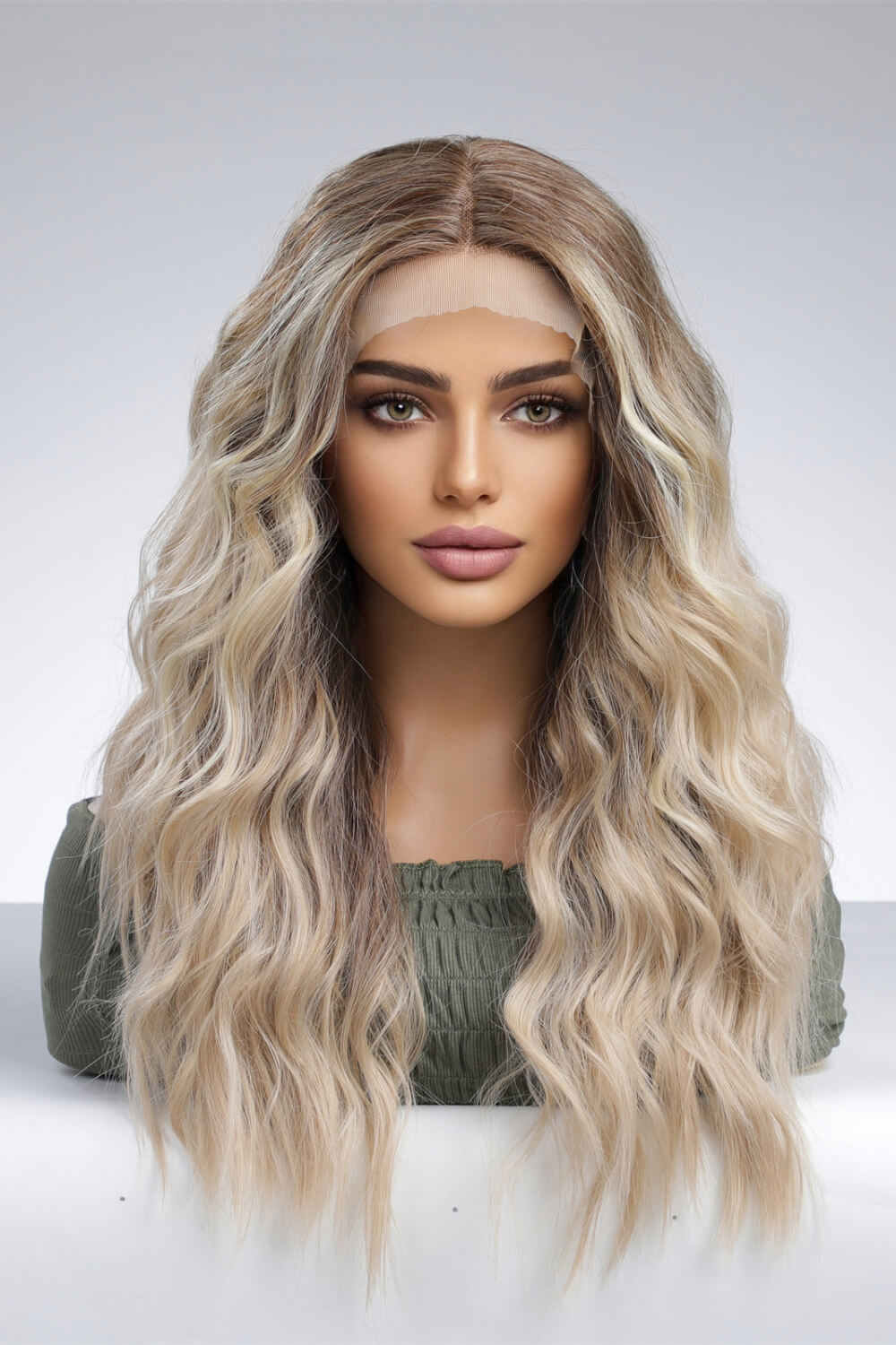 A mannequin displaying a 13*2'' lace front wig with long wavy synthetic hair, showcasing its natural look and 150% density.