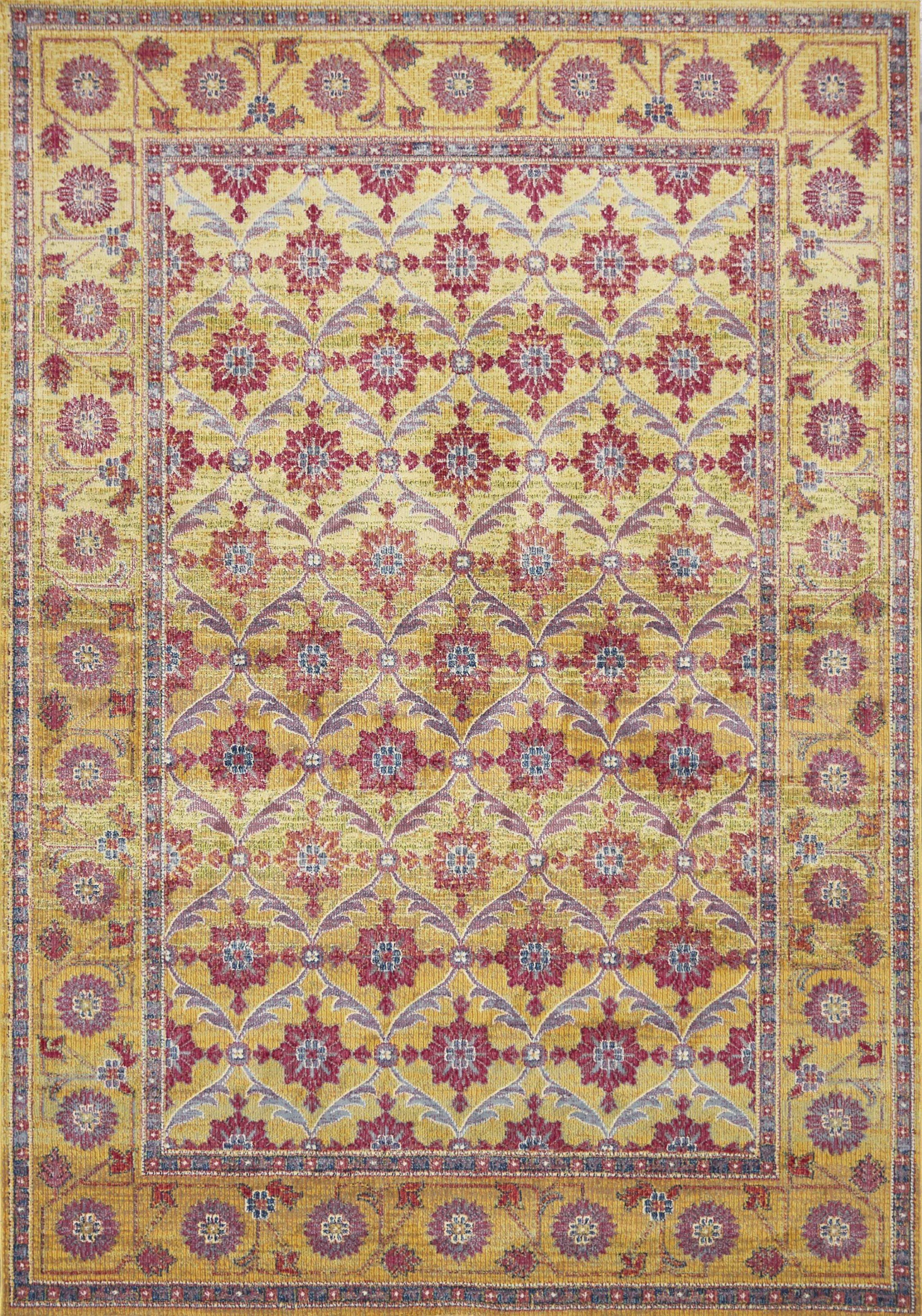 A luxurious 118" x 158" gold polypropylene rug from the Dreamweaver Collection, featuring intricate patterns and a vibrant color palette.