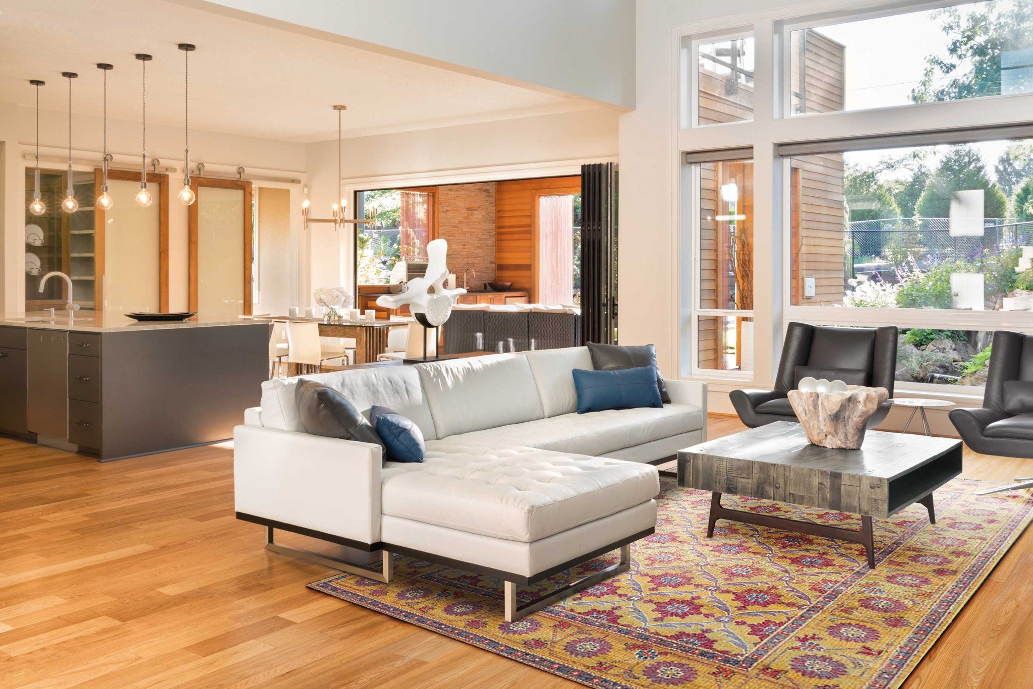 A luxurious 118" x 158" gold polypropylene rug from the Dreamweaver Collection, featuring intricate patterns and a vibrant color palette.