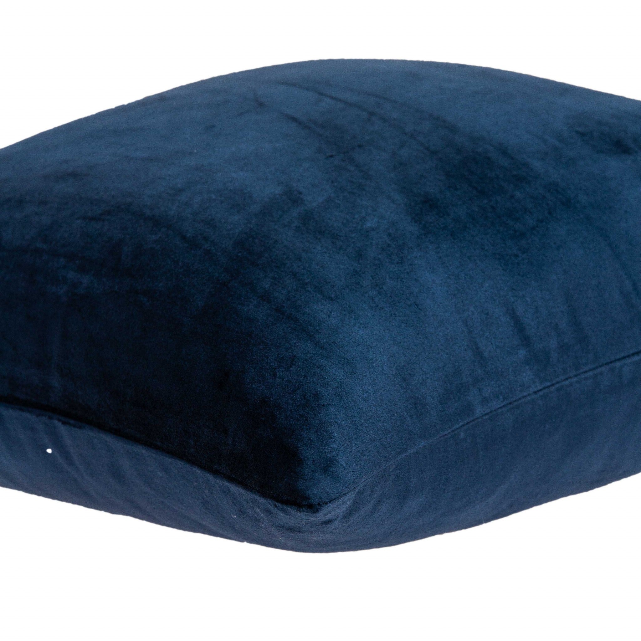 Transitional navy blue solid pillow measuring 18x7x18 inches, featuring a soft cotton and viscose blend cover with polyfill insert.