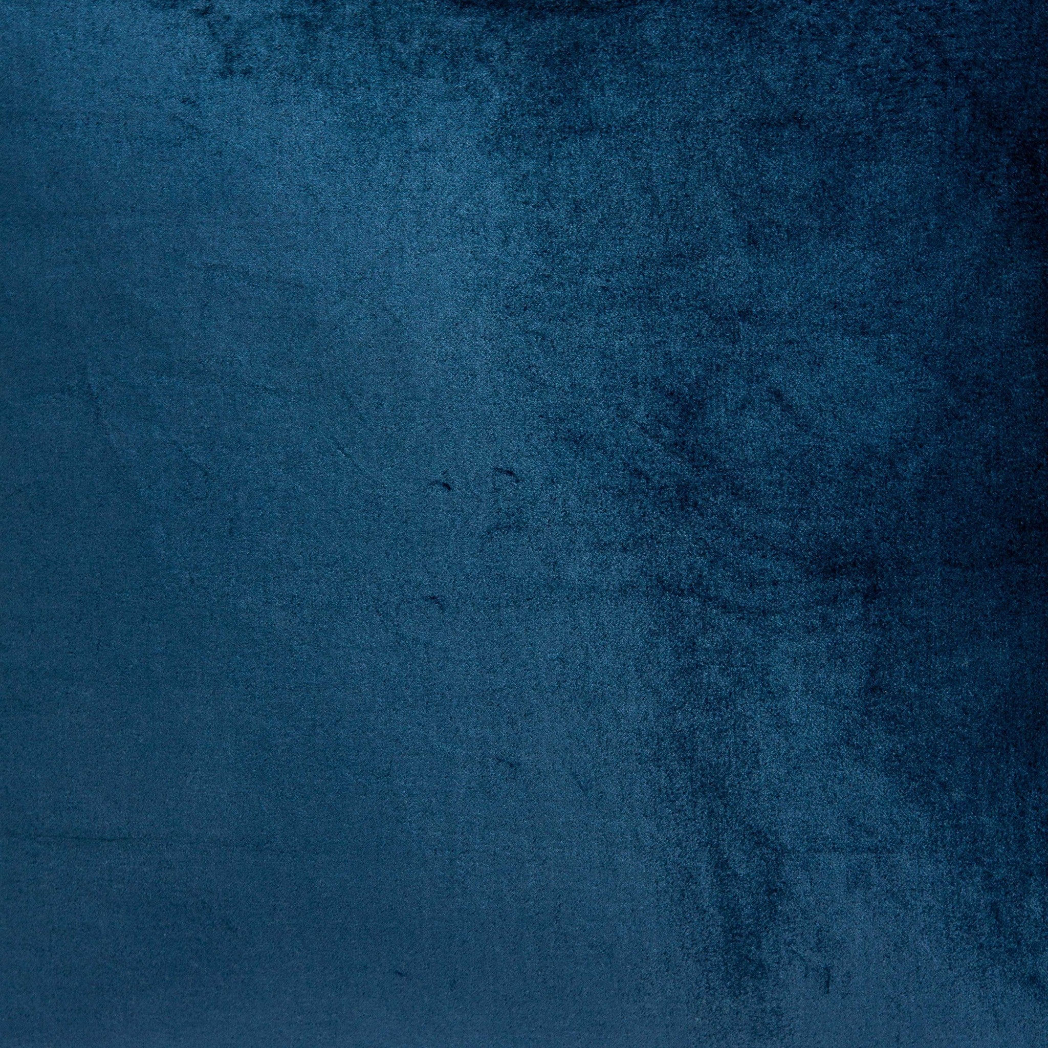 Transitional navy blue solid pillow measuring 18x7x18 inches, featuring a soft cotton and viscose blend cover with polyfill insert.