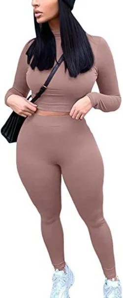 A stylish 2 piece outfit featuring a sexy long sleeve crop top and high-waisted bodycon pants, perfect for casual and workout occasions.