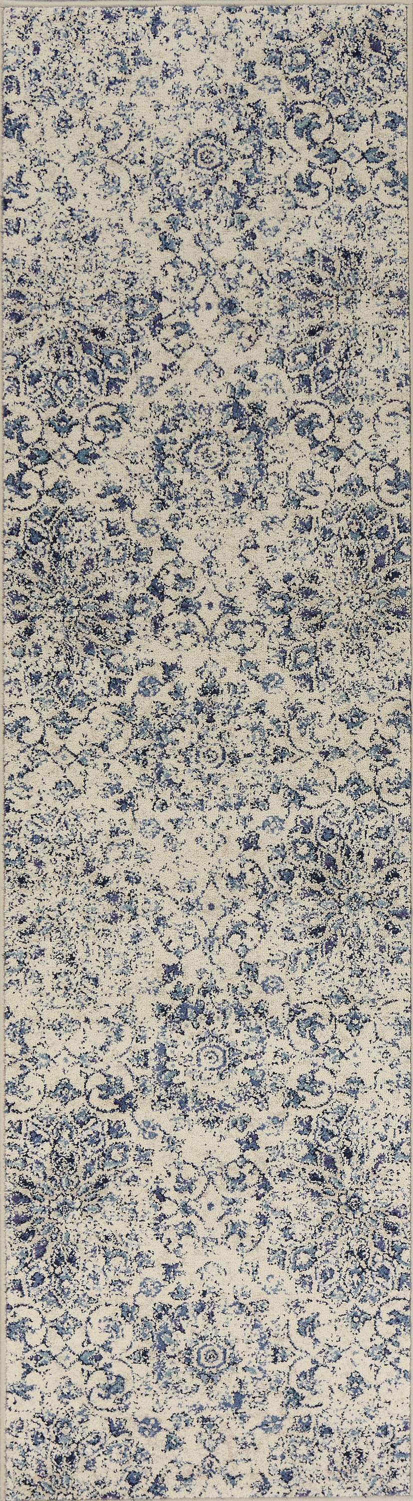 A beautiful 2' x 7' polypropylene area rug in ivory and blue mosaic design, showcasing intricate patterns and a plush texture.