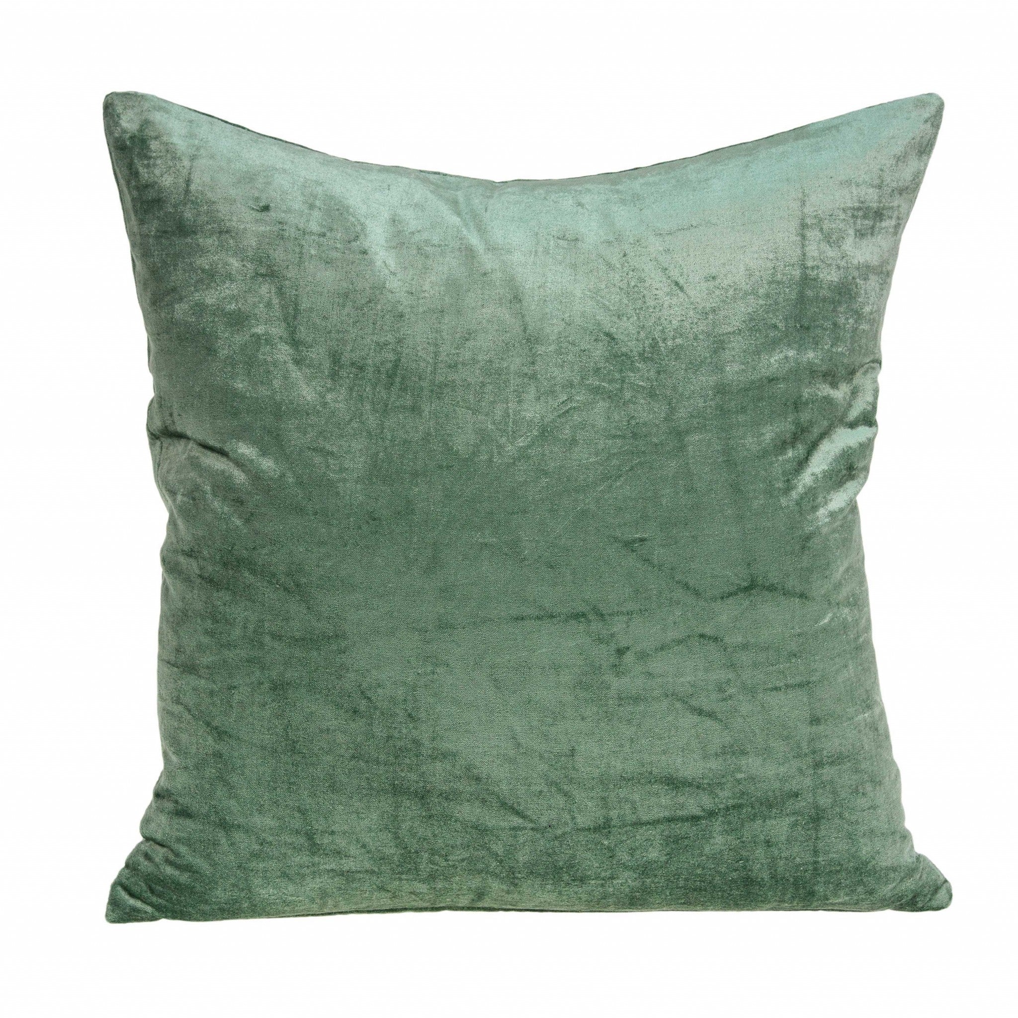 Transitional green solid pillow cover measuring 20x7x20 inches, made from a cotton and viscose blend, featuring a polyfill insert.