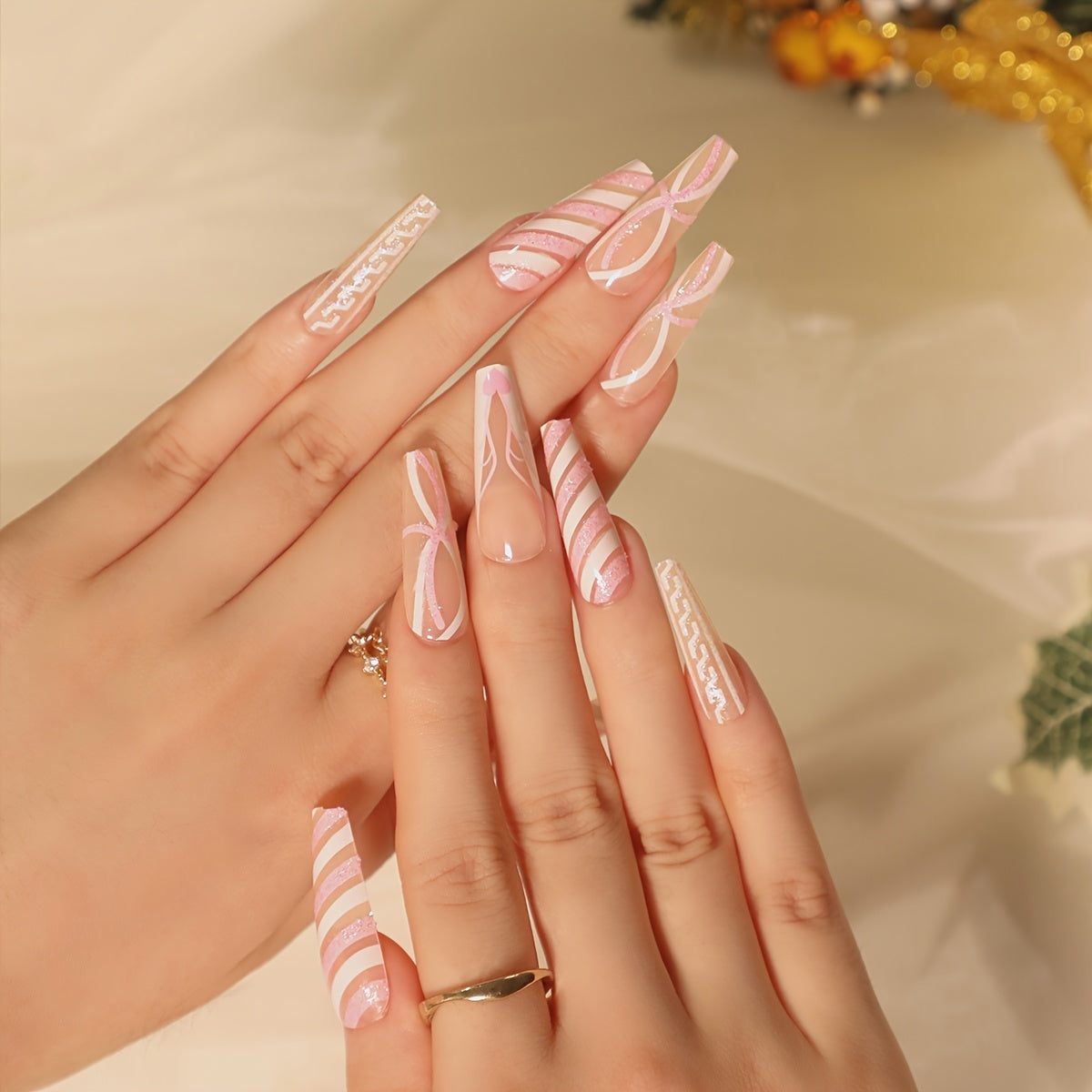 24Pcs Extra Long Press On Nails featuring transparent pink and white stripes in a ballerina shape, perfect for stylish manicures.