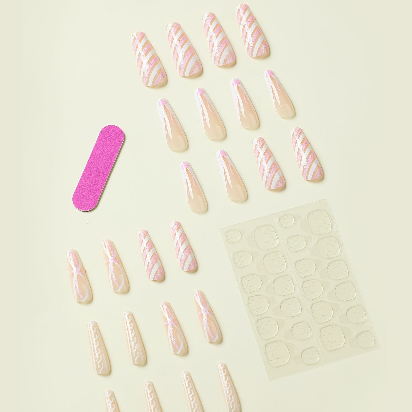 24Pcs Extra Long Press On Nails featuring transparent pink and white stripes in a ballerina shape, perfect for stylish manicures.