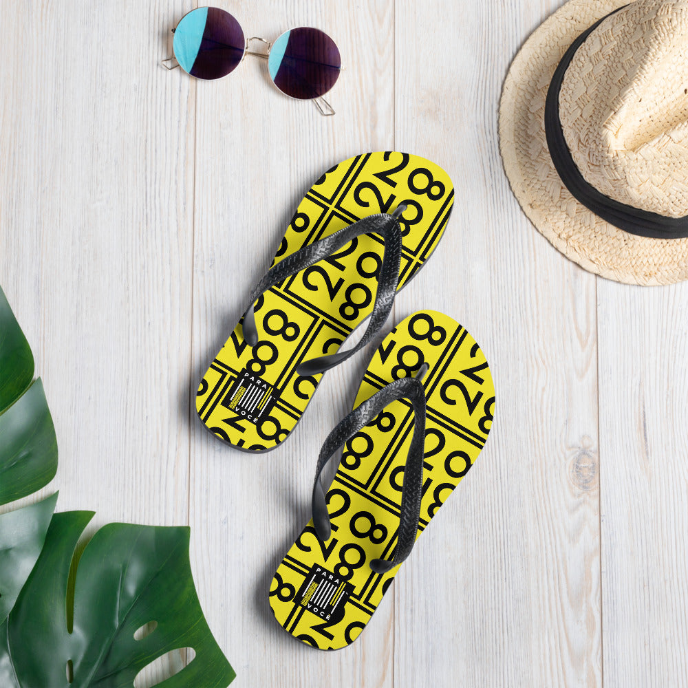Bright yellow 2882Sport™ flip-flops with rubber sole and black Y-shaped straps, perfect for summer wear.