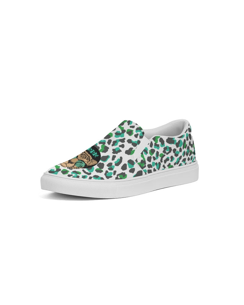 2882Sport™ Tropics of Oz Men's Cheetah Slip-On Canvas Shoes featuring a vibrant cheetah print and Shady Lion graphic.