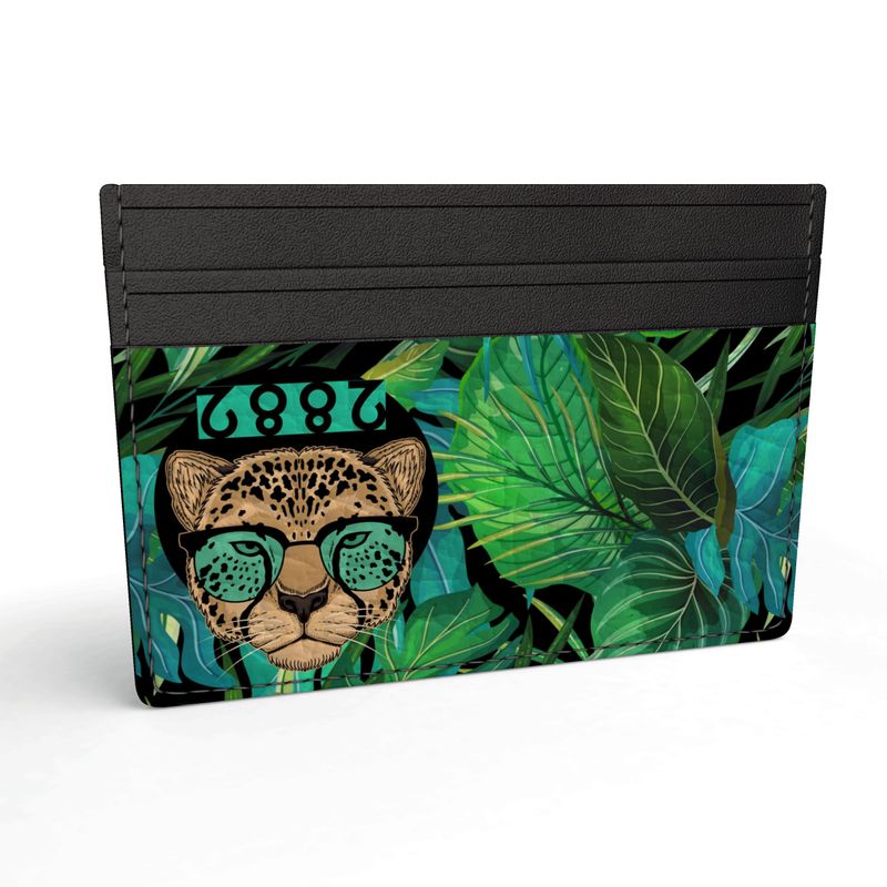 2882Sport Tropics Of Oz Men's Leather Credit Card Wallet featuring a vibrant tropical print and the Shady Lion Icon.