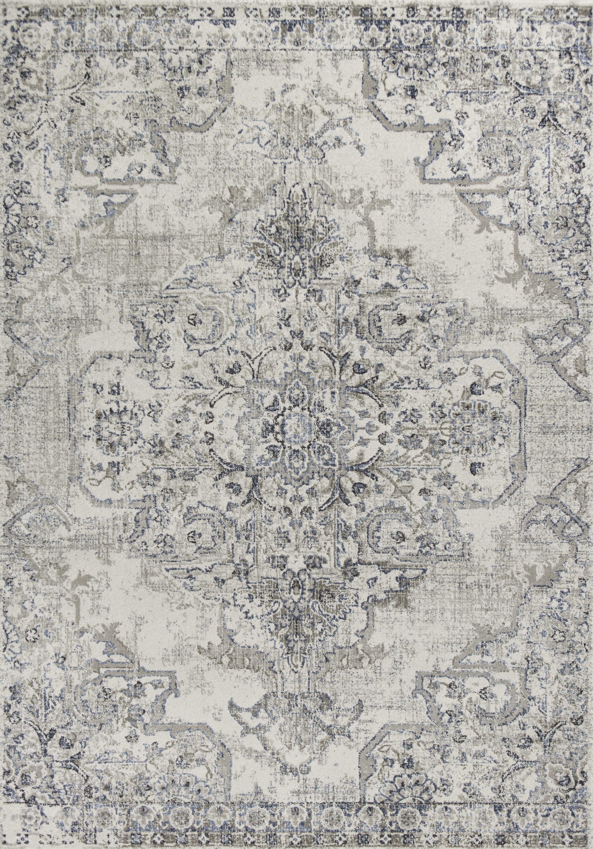 3' x 5' ivory and grey medallion area rug, showcasing intricate patterns and high-quality polypropylene material.