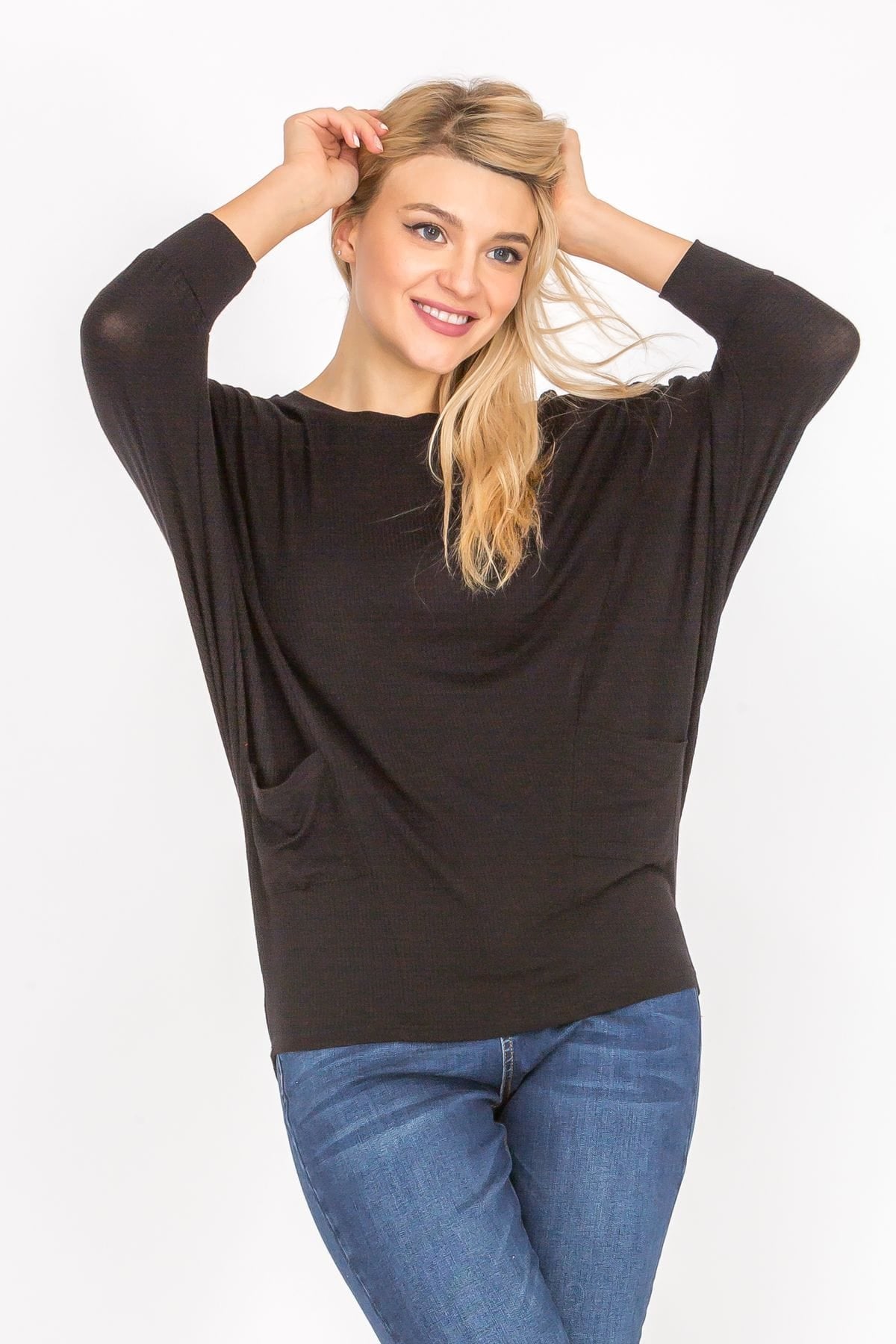 A stylish 3/4 sleeve lightweight ribbed dolman knit batwing blouse in a soft fabric, featuring a boat neck and two front pockets.