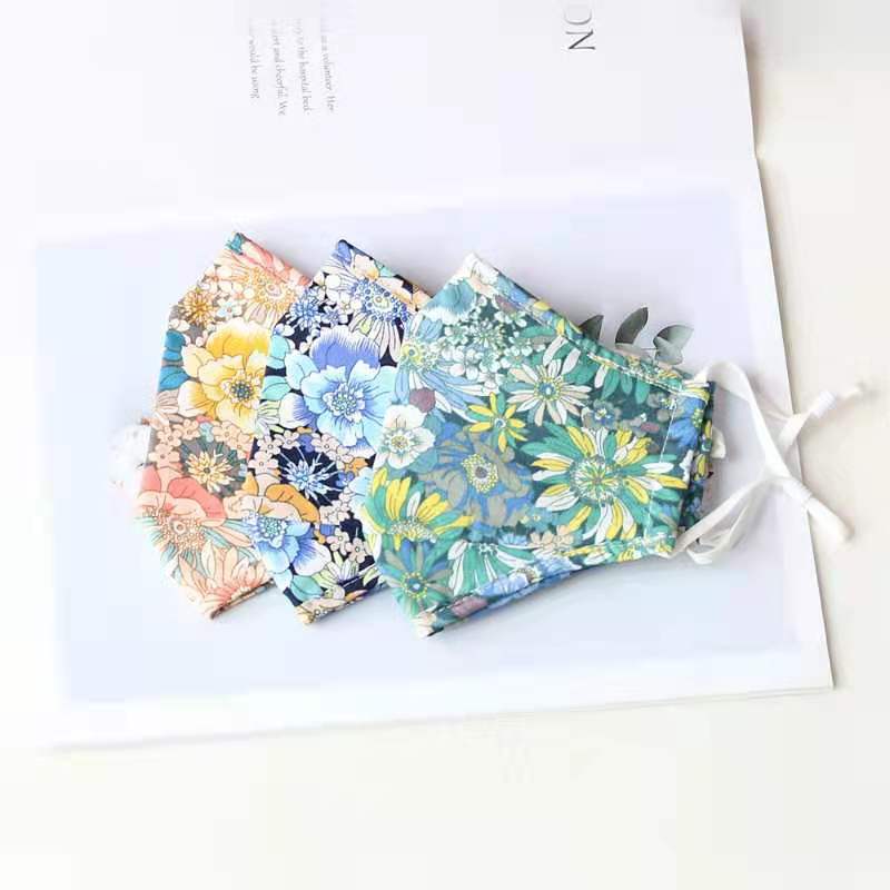 Three stylish dream floral cotton face masks with adjustable ear loops and filter pocket for added protection.