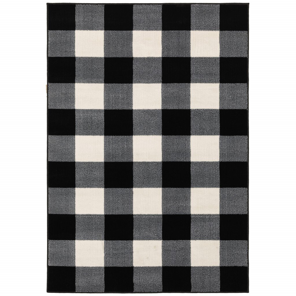 5x7 Monochromatic Gingham Pattern Indoor Area Rug featuring black, gray, and white checkered design, perfect for enhancing living spaces.