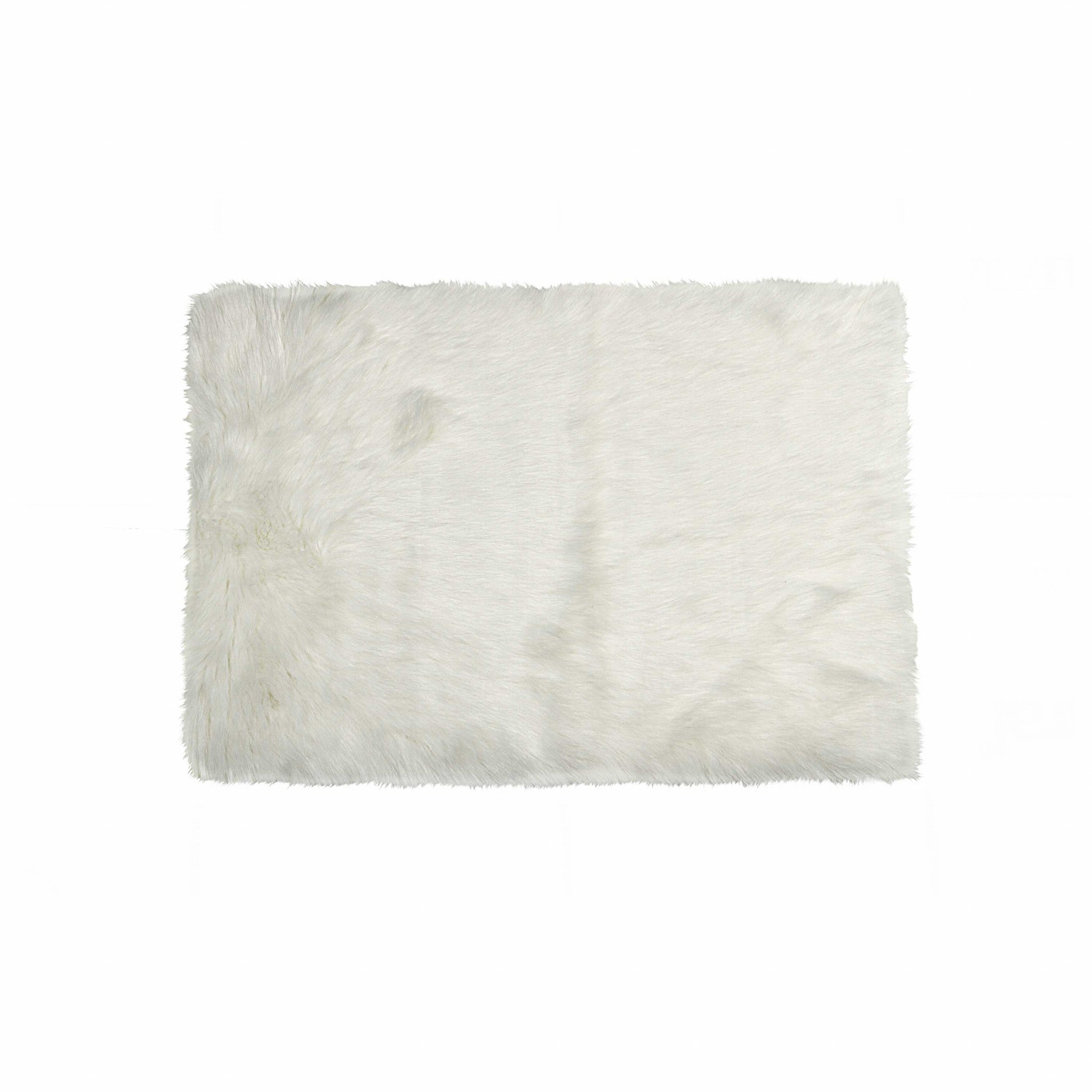 5x8 off white faux fur rectangular area rug, showcasing its luxurious texture and elegant design, perfect for enhancing any living space.