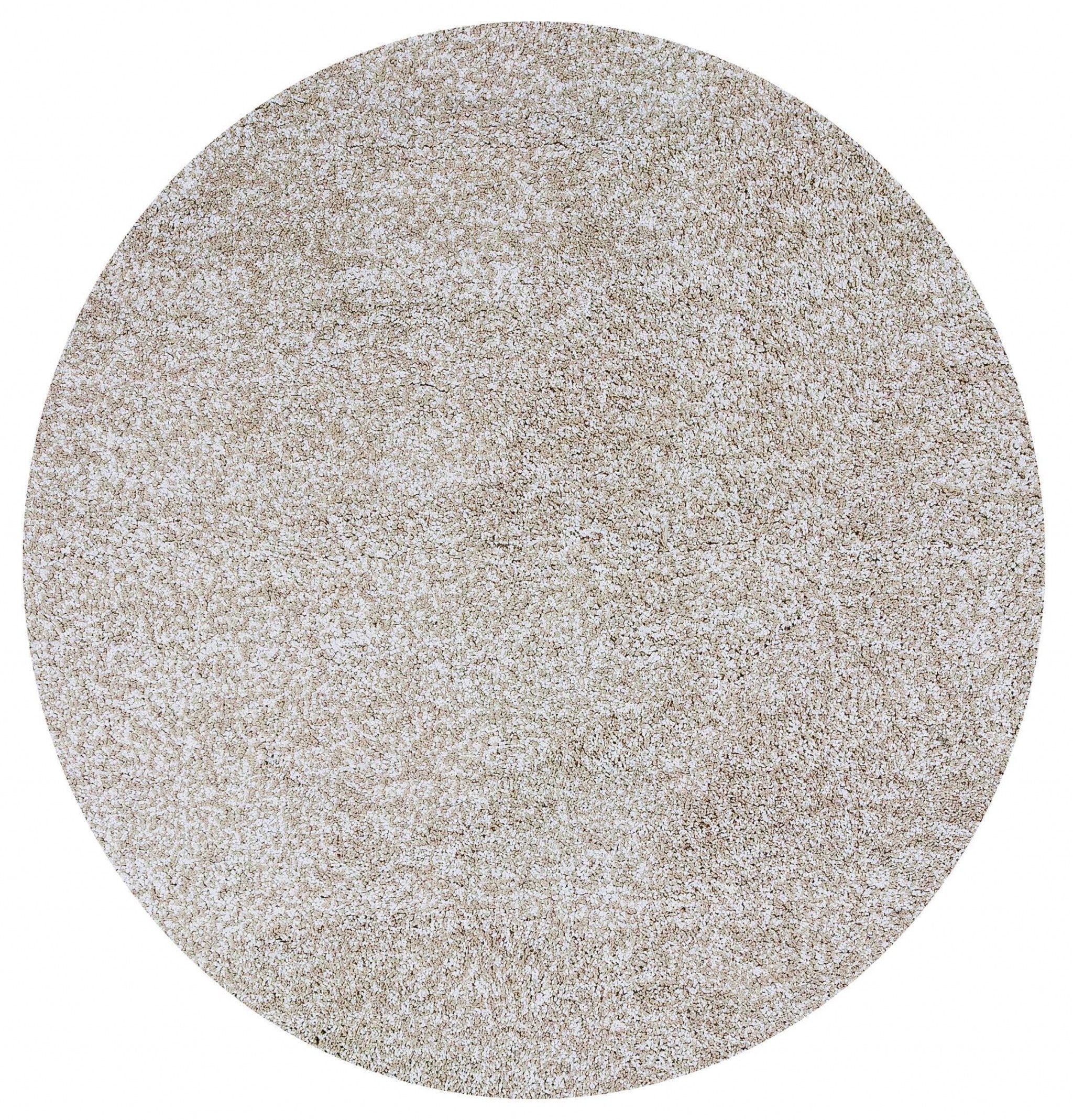 6-inch round ivory heather shag rug with a soft texture, perfect for indoor use, enhancing home decor.