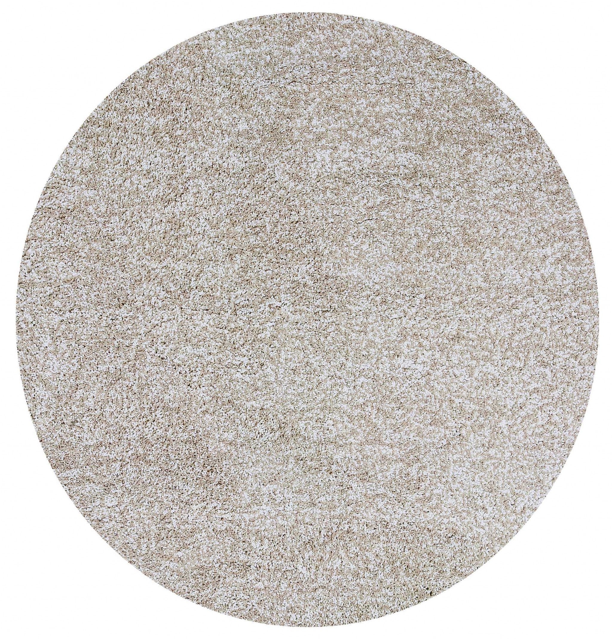6-inch round ivory heather shag rug with a soft texture, perfect for indoor use, enhancing home decor.