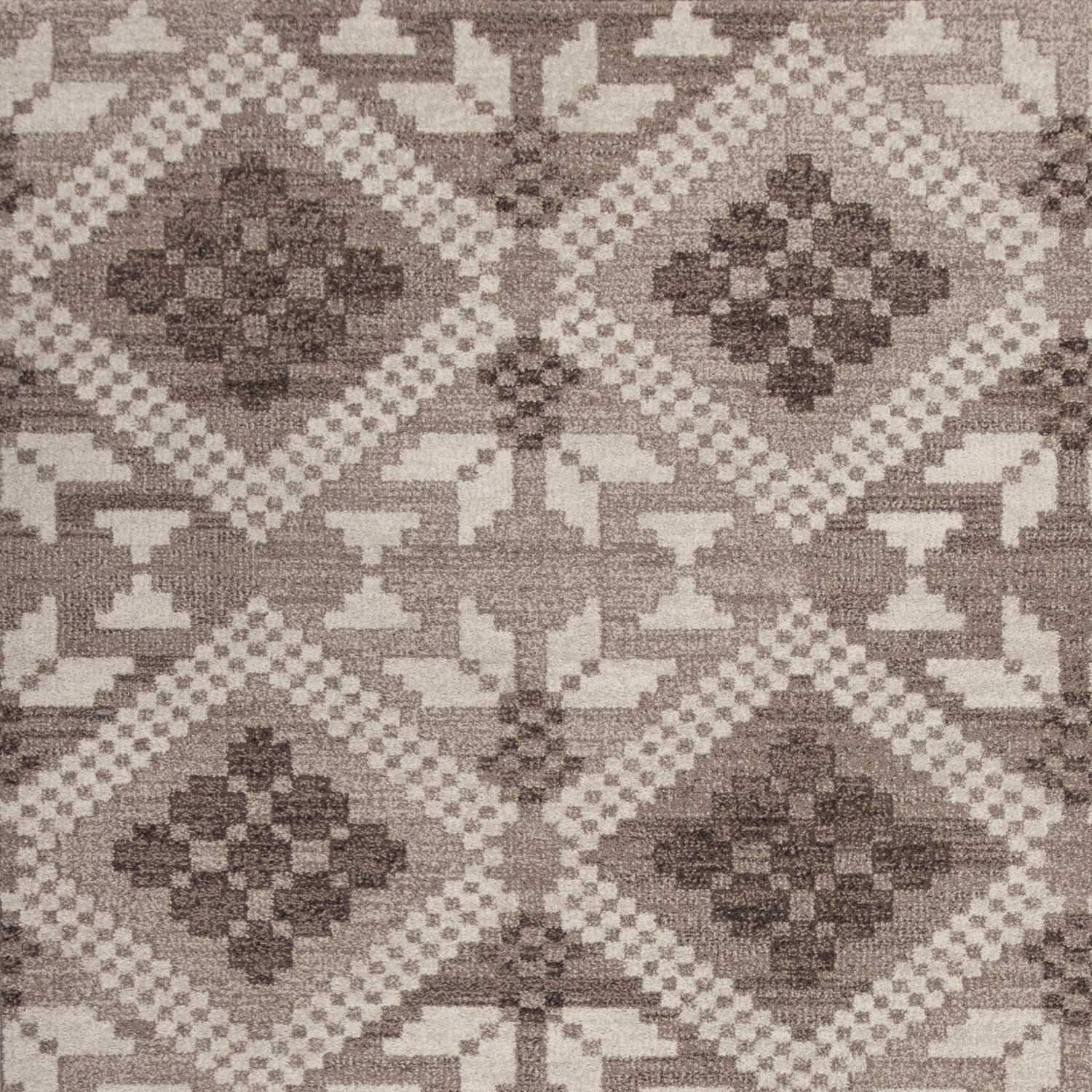 7' x 11' taupe polypropylene area rug with bohemian design, showcasing its soft texture and elegant color.