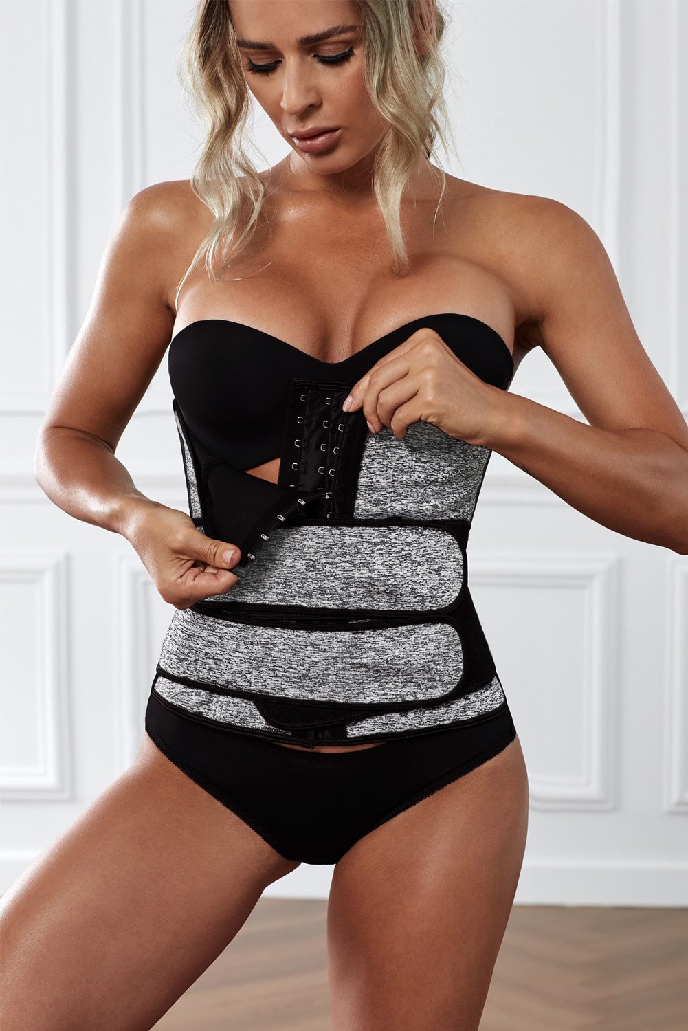 9 Steel Bones Latex Belt Waist Trainer with adjustable hooks, designed for comfort and support during workouts.