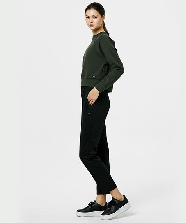 A pair of stylish 9 to 9 Pants designed for comfort and versatility, suitable for travel and casual outings.