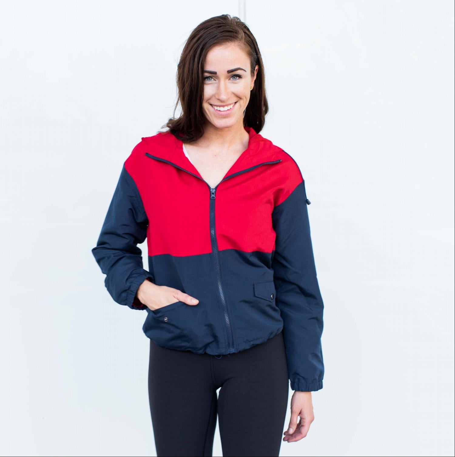 Active Hooded Colorblock Windbreaker Jacket in stylish design, featuring front pockets and a lightweight fabric, perfect for workouts.