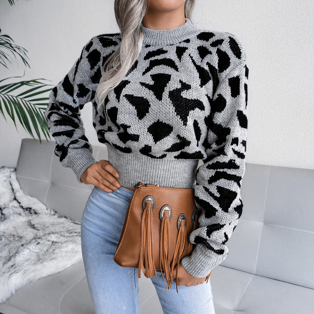 A stylish leopard print waist knit open cardigan, perfect for autumn and winter, showcasing its soft fabric and trendy design.