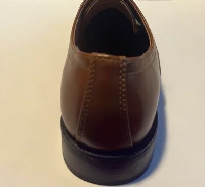 Alfani Men's Andrew Plain Toe Derbys showcasing sleek lace-up design and padded collar, perfect for work or formal occasions.