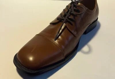 Alfani Men's Andrew Plain Toe Derbys showcasing sleek lace-up design and padded collar, perfect for work or formal occasions.