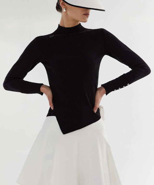 Anell Golf Classic Slim Knit Top in Black featuring a turtleneck and diagonal design details.