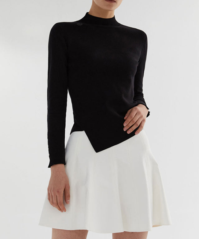 Anell Golf Classic Slim Knit Top in Black featuring a turtleneck and diagonal design details.