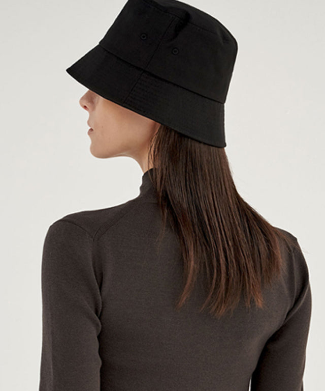 Anell Golf Cotton Classic Bucket Hat in Black, featuring a classic design and comfortable cotton lining.