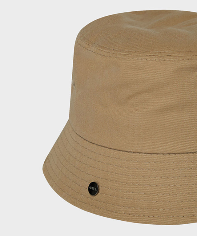 Anell Golf Cotton Classic Bucket Hat in Sand Beige, showcasing its classic design and comfortable fit.