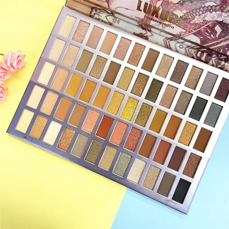 Anime 60 Color Earth Tone Eyeshadow Palette showcasing a variety of vibrant earth tone shades in matte, shimmer, and metallic finishes.