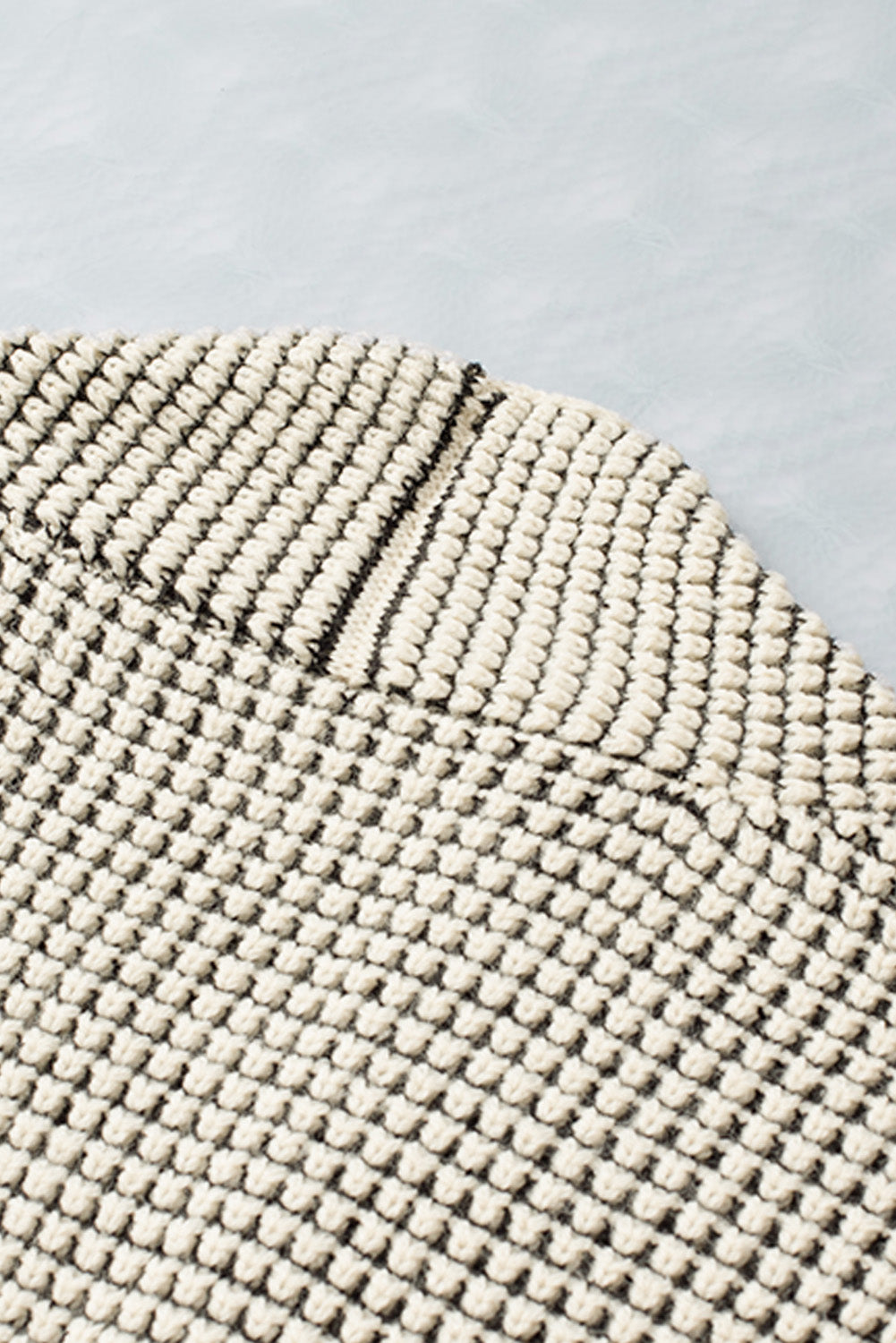 Apricot plaid knitted long open front cardigan displayed on a mannequin, showcasing its stylish design and comfortable fit.