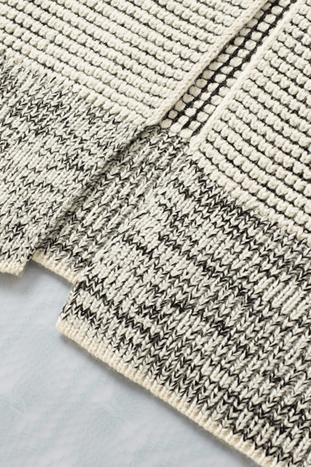 Apricot plaid knitted long open front cardigan displayed on a mannequin, showcasing its stylish design and comfortable fit.