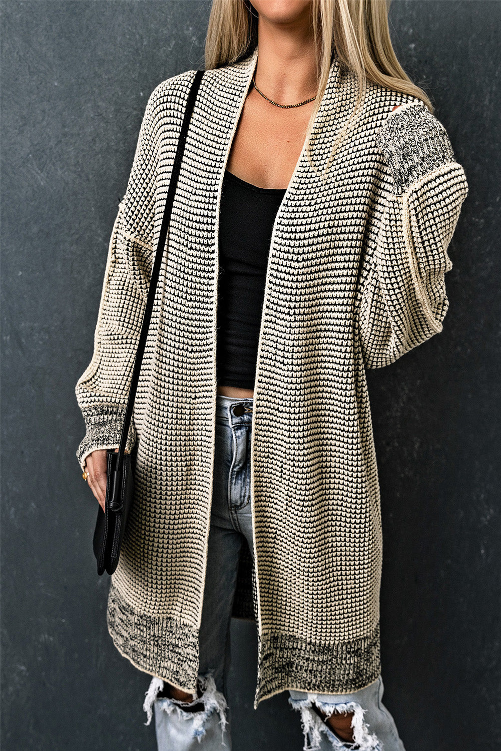 Apricot plaid knitted long open front cardigan displayed on a mannequin, showcasing its stylish design and comfortable fit.