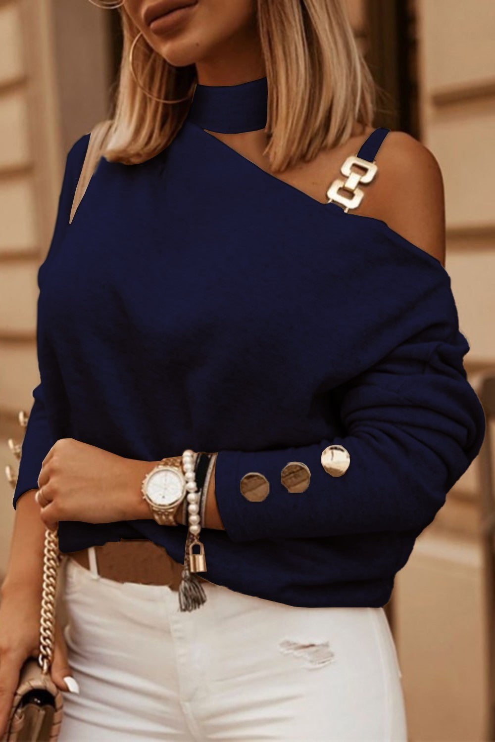 Asymmetrical Neckline T-shirt Mirabelle in Dark Blue featuring a high neckline, long sleeves with buttons, and a stylish metal detail strap.